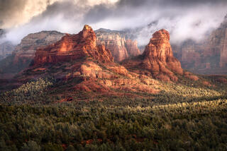 clouds coming off the rocks of Soldiers Pass in Sedona, AZ